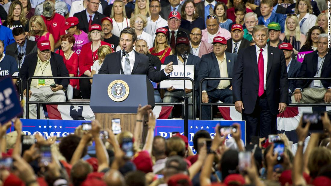DeSantis addresses a crowd in Tampa, Florida, at a rally for President Donald Trump in July 2018.