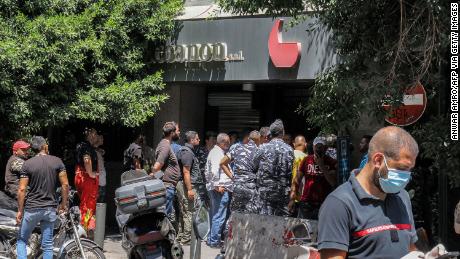Armed man takes hostages at Beirut bank demanding return of frozen funds 