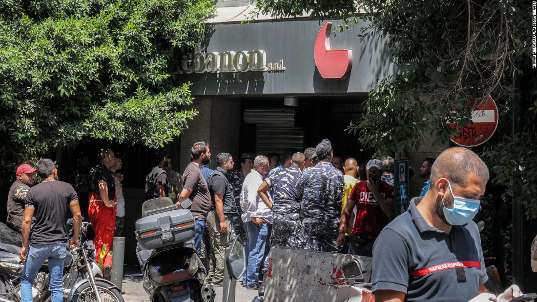 A gunman takes hostages in a Beirut bank, demanding the return of frozen cash