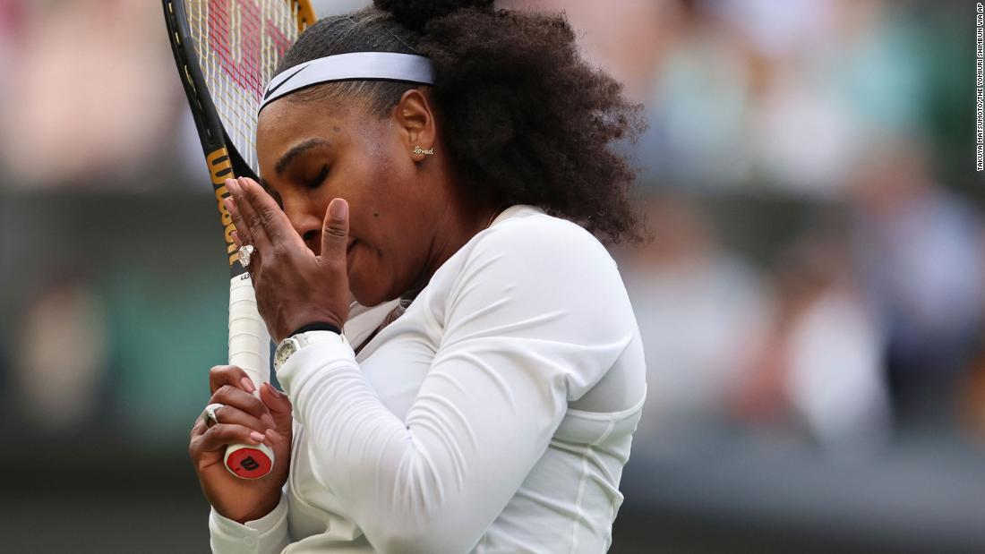 Serena reacts during her first-round Wimbledon loss to Harmony Tan in June.