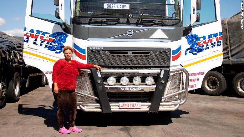 Driver Memory Lambie poses with her truck. &quot;The bridge is 100% perfect to us,&quot; she says. 