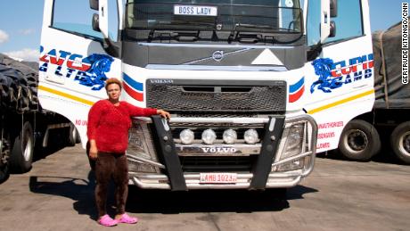 Driver Memory Lambie poses with her truck. &quot;The bridge is 100% perfect to us,&quot; she says. 