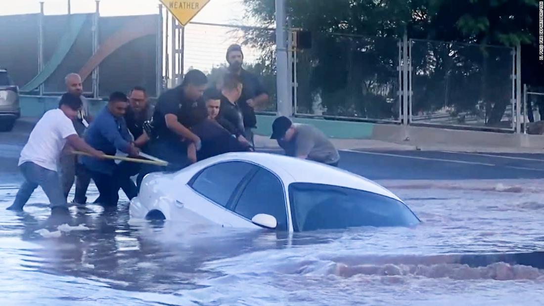 Watch dramatic rescue as car gets sucked into sinkhole – CNN Video