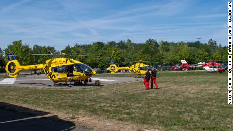 A rescue helicopter was spotted in a field near the amusement park. 