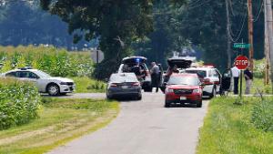 The area near Center and Smith roads was closed for hours during a standoff Thursday, Aug. 11, 2022, in Clinton County, Ohio, after an armed man tried to breach the FBI&#39;s Cincinnati office and fled north on the highway. (Nick Graham/Dayton Daily News via AP)