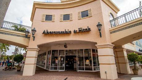 Estero, FL USA - 2-10-2022: Shoppers walk past the facade of Abercrombie &amp; Fitch Clothing Store in Miromar Outlets. an American lifestyle retailer that focuses on casual wear. 