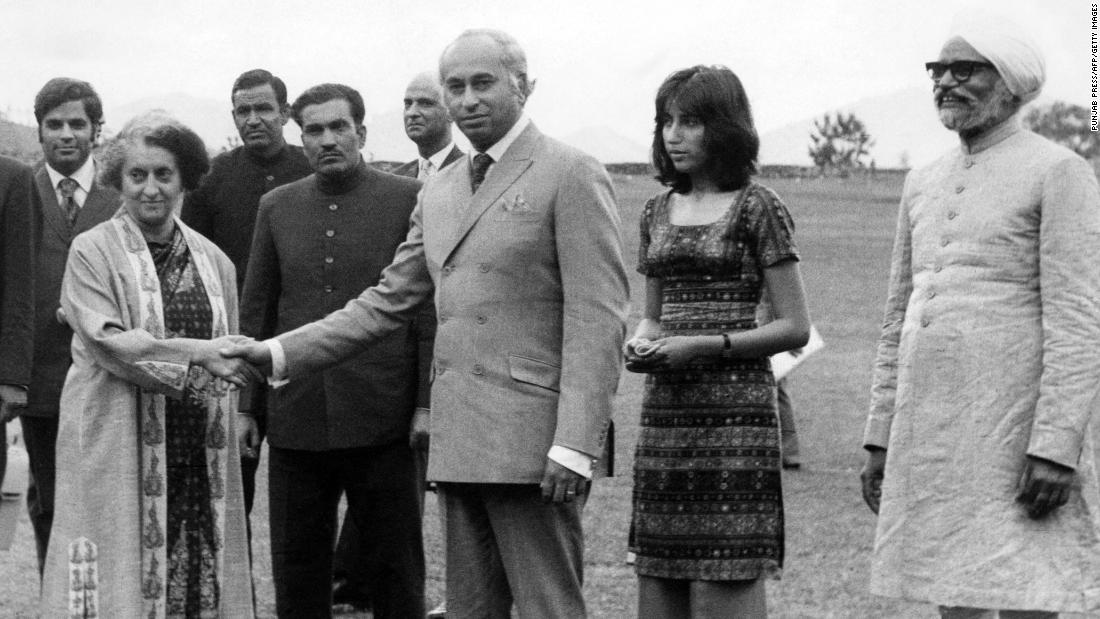 Pakistani President Zulfikar Ali Bhutto with India&#39;s Prime Minister Indira Gandhi on June 28, 1972 in Shimla, the former summer capital of British India, while his daughter Benazir Bhutto (second from the right) and Indian Foreign Minister Swaran Singh look on. Bhutto visited India to meet Gandhi and negotiated a formal peace agreement and the release of 93,000 Pakistani prisoners of war. The two leaders signed the Shimla Agreement, which committed both nations to establish a Line of Control in Kashmir.