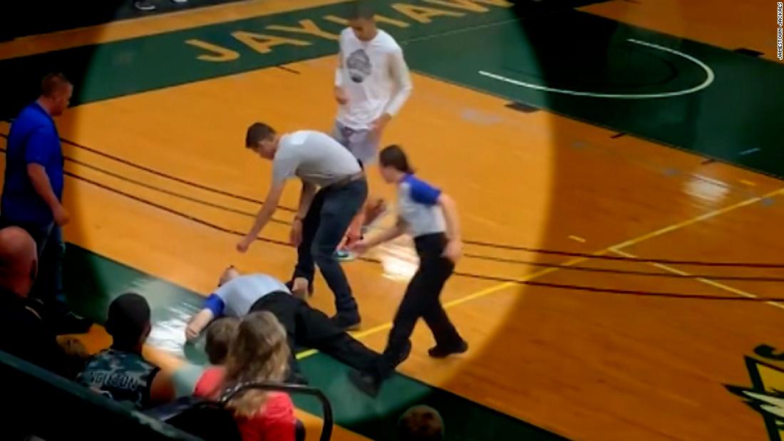 A referee collapsed during a basketball game. See what happened next
