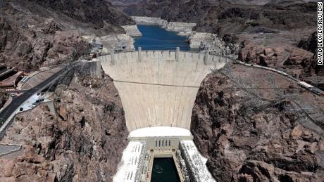 The West&#39;s historic drought is draining Lake Mead, and the lower it gets, the less hydroelectricity Hoover Dam can produce.