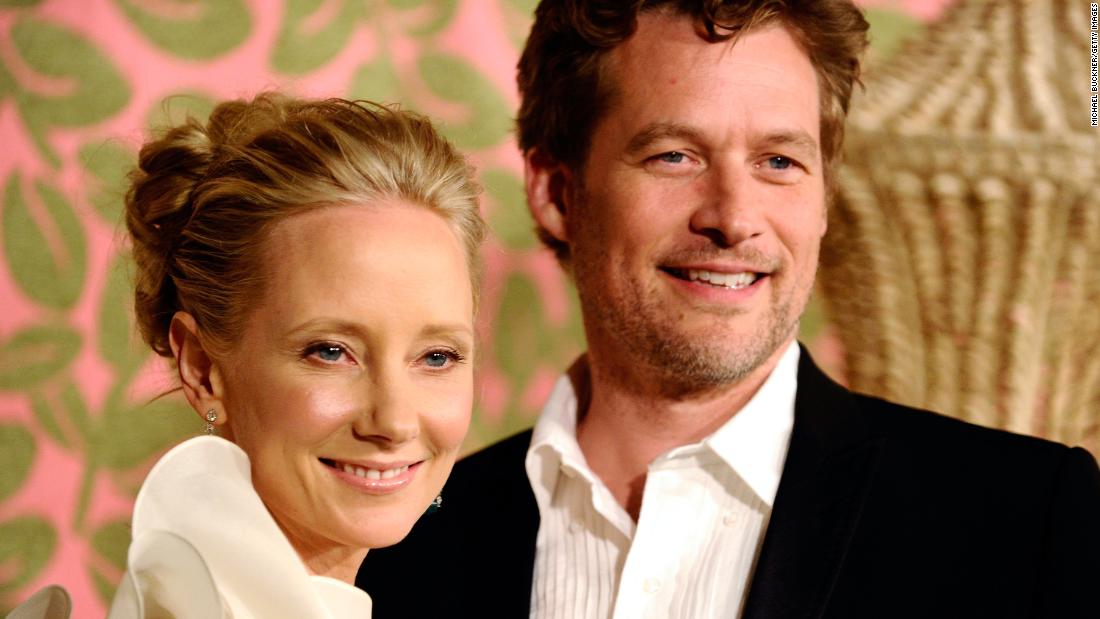 Heche and boyfriend James Tupper arrive at an Emmy Awards reception in 2010. They had a son together, Atlas.