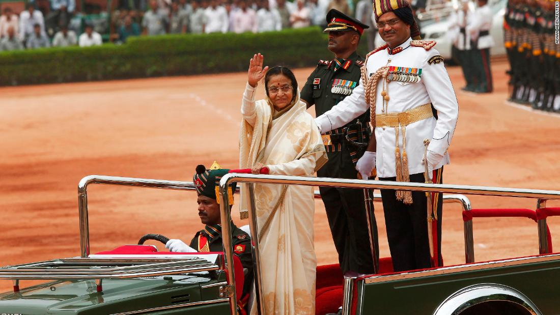 India&#39;s first female president Pratibha Patil waves to photographers in New Delhi on July 25, 2012. 