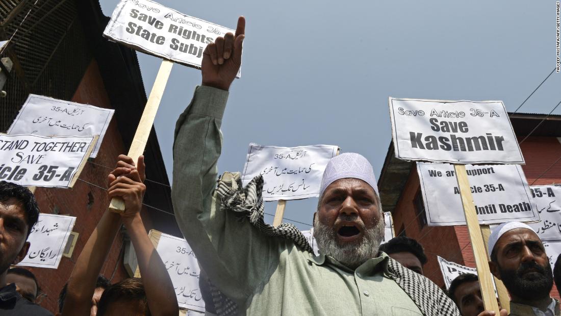 Kashmiri Shiite Muslims shout anti-Indian slogans during a demonstration against attempts to revoke Kashmir&#39;s special status, in Srinagar on August 24, 2018. A year later, India&#39;s Prime Minister Narendra Modi revoked Article 370, which was in place since 1949 and gave the states of Jammu and Kashmir the power to have their own constitution, flag and autonomy over all matters, save for certain policy areas such as a foreign affairs and defense.
