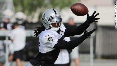 Adams catches a pass during the team's first fully padded practice during training camp. 