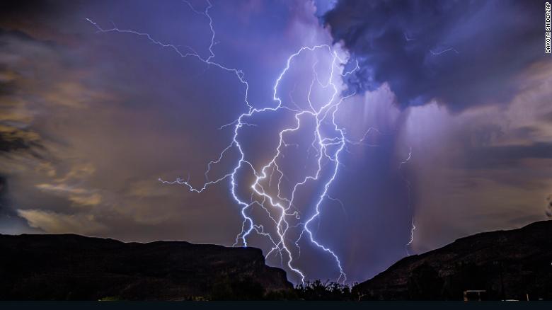 A thunderstorm is seen from Highway 159 over Las Vegas on August 11, 2022.