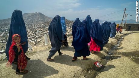 Shakeela Rahmati and other women make the three-hour walk from their home on the outskirts of Kabul to the city center.