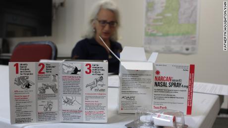 Dr. Laurel Desnick, Public Health Officer for the Park City-County Health Department in Montana, prepares to deliver boxes of Narcan to local hotels.  Free distribution of Narcan, the brand name for the drug naloxone, which can reverse opioid overdoses, is a public health strategy triggered by the COVID-19 pandemic.