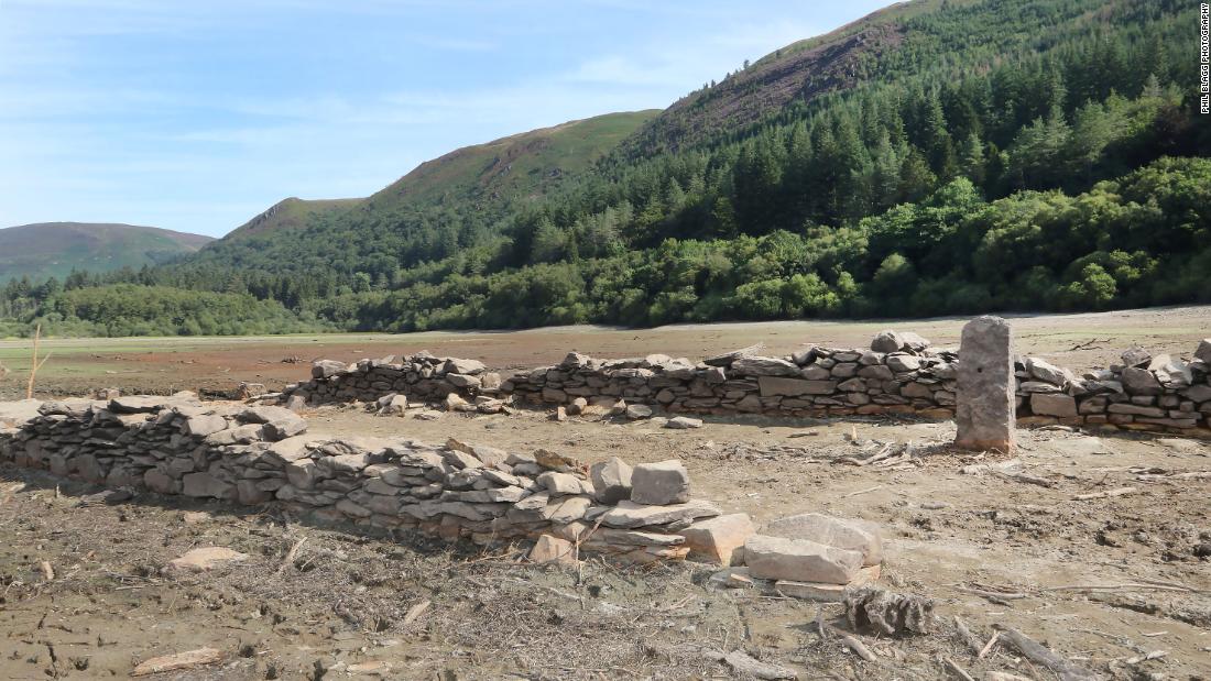 Drought reveals Welsh village submerged by reservoir in 19th century