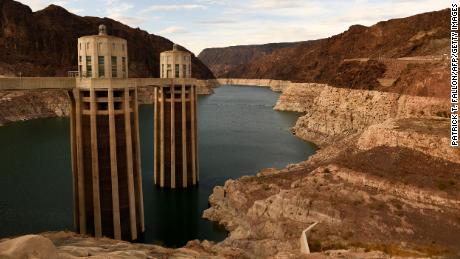 As the Colorado River crisis escalates, some officials say it's time for the federal government to tackle water cuts 