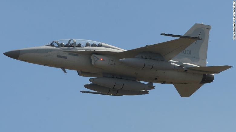 A South Korean-made FA-50 multirole light fighter aircraft of the Philippine Air Force performs a fly-past during a ceremony prior to landing at the Clark Air Base in Angeles City on November 28, 2015. 