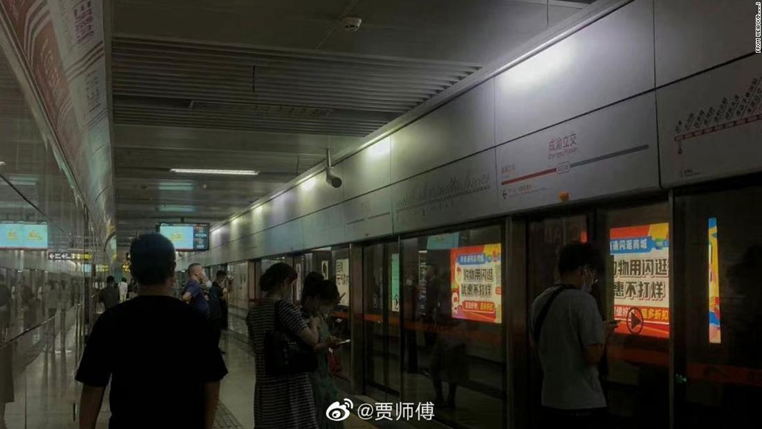 China dims lights in Chengdu subway to save power as heat soars