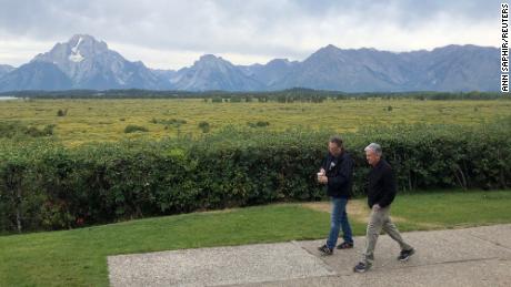 Fed chair Jerome Powell and New York Federal Reserve President John Williams take a walk before the last in-person Jackson Hole  economic summit, which was held in 2019. 