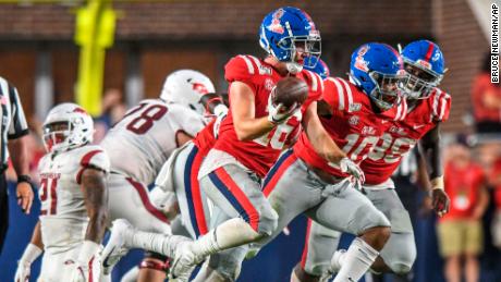 Luke Knox celebrates an awkward recovery while playing for Ole Miss during an NCAA college football game on September 7, 2019.