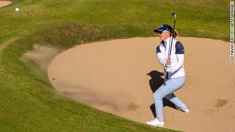 De Roey, pictured at the Women's Open in Muirfield, is five strokes behind Korda.