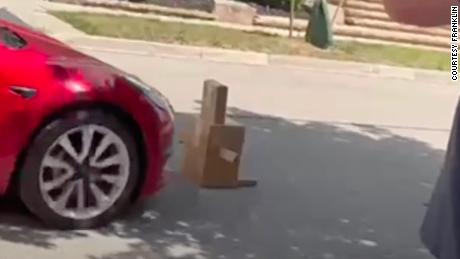 One "full self-driving"  One "box boy" Test it on the mannequin - a childlike look crafted by Franklin Cadamuro from an old Amazon cardboard box.