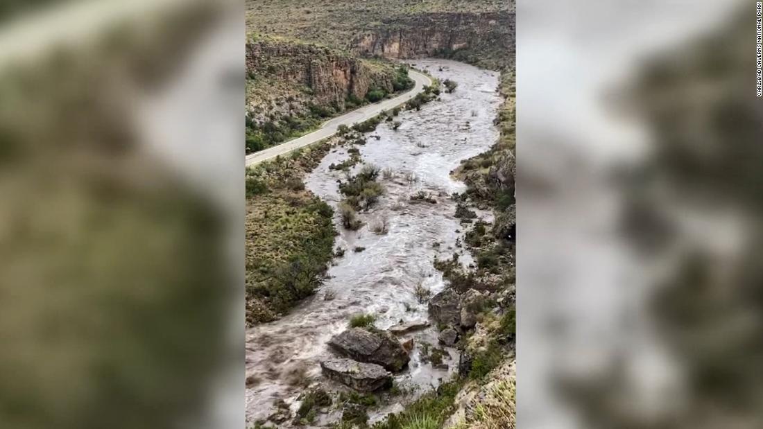 Flash flooding at a national park in New Mexico forced the evacuation of about 160 people 