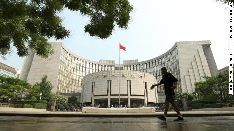 A man walks past the People&#39;s Bank of China (PBOC) building on July 20, 2022 in Beijing, China.
