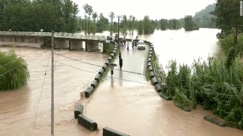 A flooded bridge following heavy rains in Mandi, Himachal Pradesh, India on August 20, 2022.