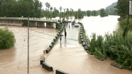 A flooded bridge after heavy rain in Mandi, Himachal Pradesh, India on August 20, 2022.