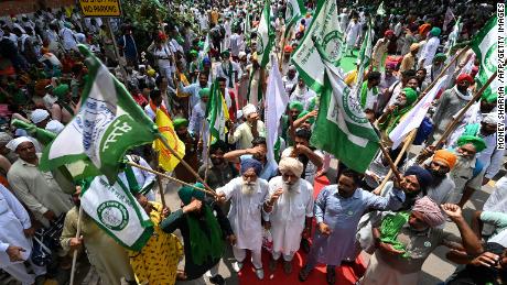 Farmers from various organizations gather as they participate in a protest against  government policies in New Delhi on August 22, 2022. 