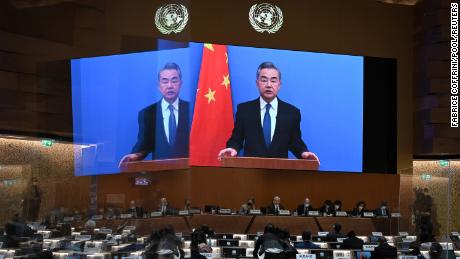 Chinese Foreign Minister Wang Yi delivers a speech via video link at the opening of a session of the UN Human Rights Council in February.