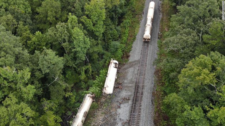2 train cars carrying carbon dioxide became detached and rolled into the embankment near Brandon, Mississippi.