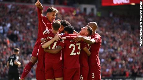 Diaz celebrates with teammates after scoring Liverpool&#39;s first goal against Bournemouth.