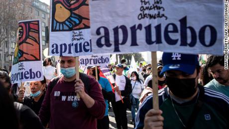 Demonstrators march in support of  the newly proposed constitution on August 20, 2022 in Santiago.