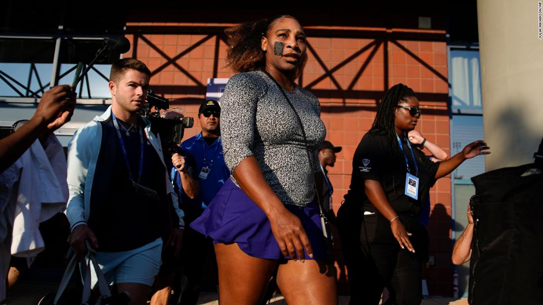 Williams walks to the practice court before her match on Monday.