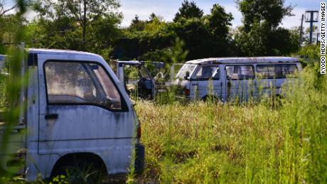 Abandoned cars in Futaba, Fukshima prefecture, on August 29, 2022.