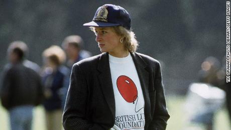 WINDSOR, UNITED KINGDOM - MAY 02:  Diana, Princess Of Wales At Guards Polo Club.  The Princess Is Casually Dressed In A Sweatshirt With The British Lung Foundation Logo On The Front, Jeans, Boots And A Baseball Cap. 