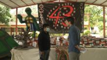 Cesar, a regular student at Ayotzinapa, talks with CNN's David Culver on a basketball court that has been turned into a memorial for the 43 missing students. 