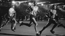 Wottle (left) races behind the US&#39; Jim Ryun (center) at Crystal Palace in London.  
