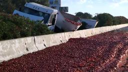 220830122248 tomato highway hp video Thousands of tomatoes spill onto highway after crash