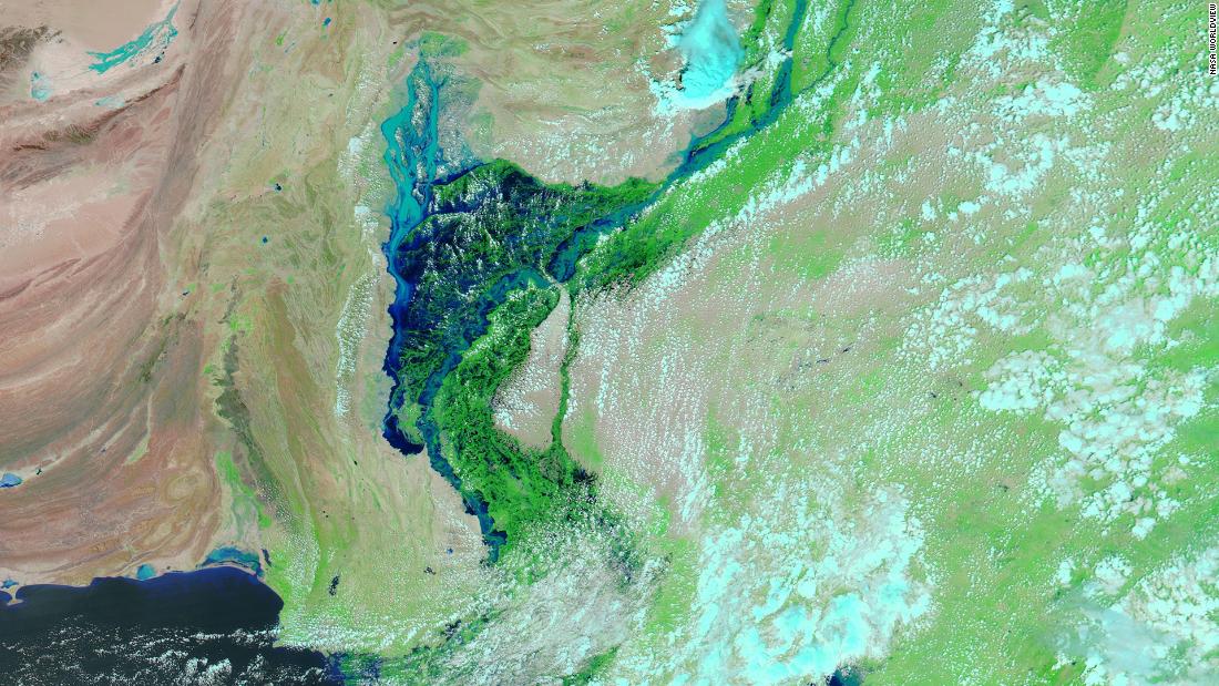 Pakistan's deadly floods have created a massive 100km-wide inland lake, satellite images show