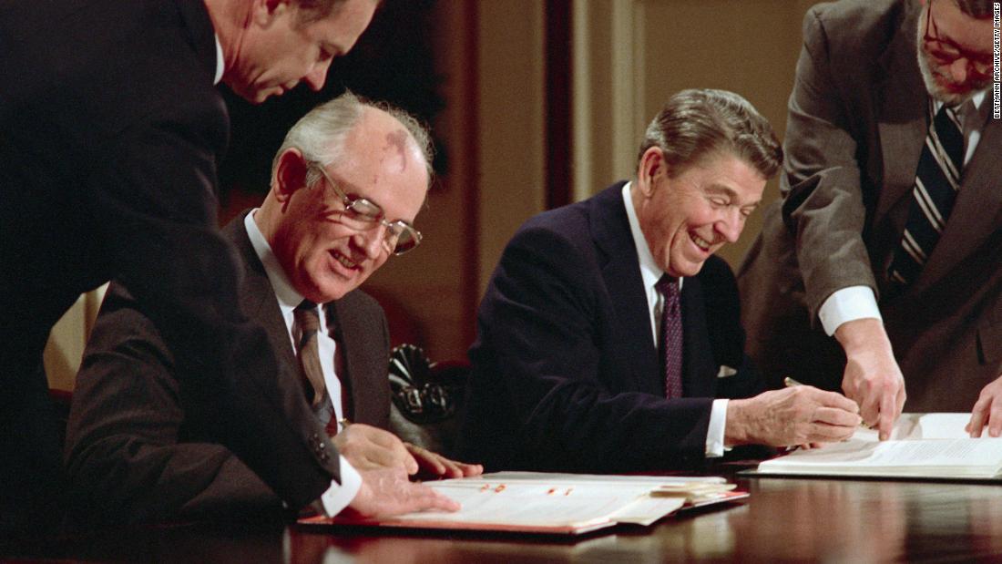 Gorbachev and Reagan sign an arms control agreement in December 1987 banning the use of intermediate-range nuclear missiles.