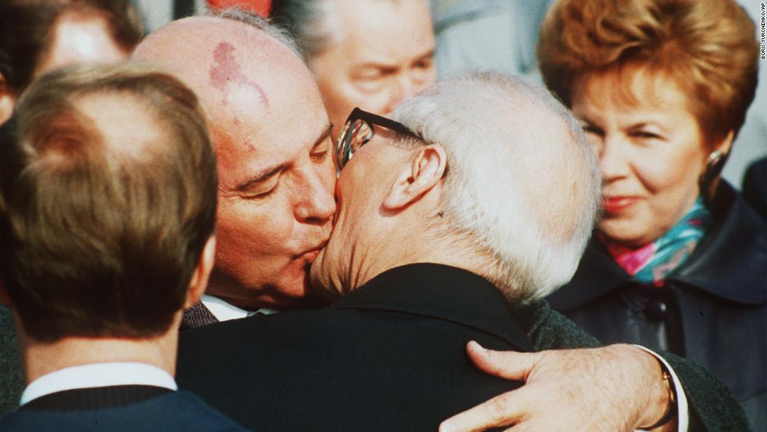 Gorbachev greets East German leader Erich Honecker after arriving in East Berlin in October 1989.