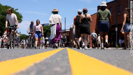 Jamaica Plain, MA - July 10: People walked down Centre Street during the Boston Open Streets event in Jamaica Plain. (Photo by Jessica Rinaldi/The Boston Globe via Getty Images)