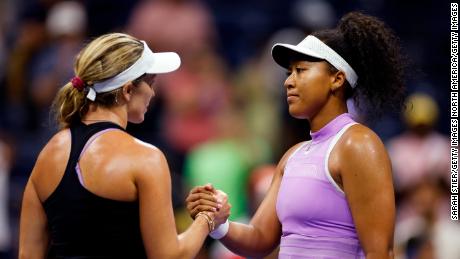 Danielle Collins shakes hands with Naomi Osaka after beating her in the first round. 