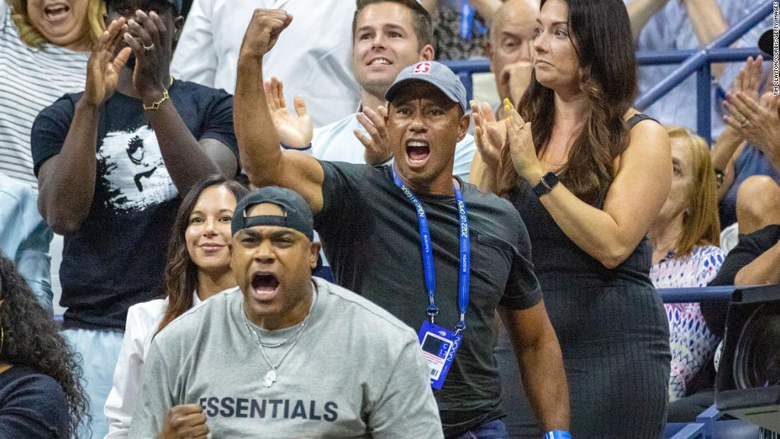 Golf legend Tiger Woods reacts to a Williams point on Wednesday.