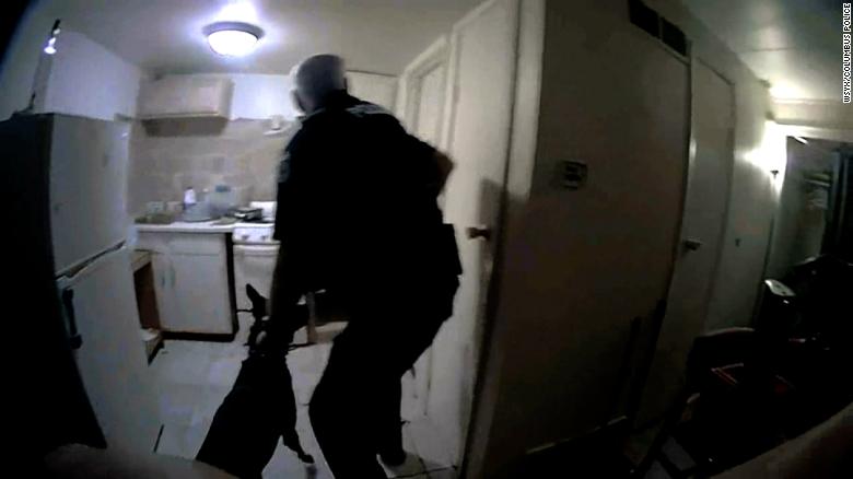 A screengrab from bodycam footage shows Columbus Police Officer Ricky Anderson and K9 moments before shooting and killing 20-year-old Donovan Lewis.